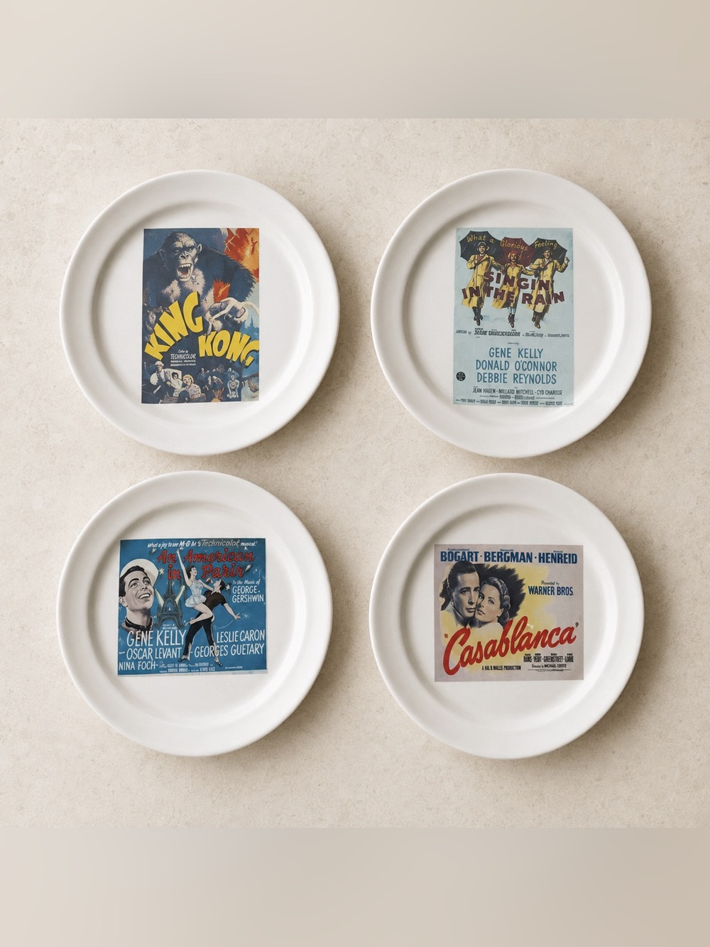 Pottery Barn White Decorative Film Reel Plate Set with Vintage Poster Motifs
